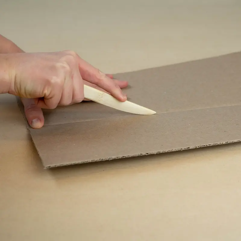 Precision Cardboard Scoring Tool for Clean Folding